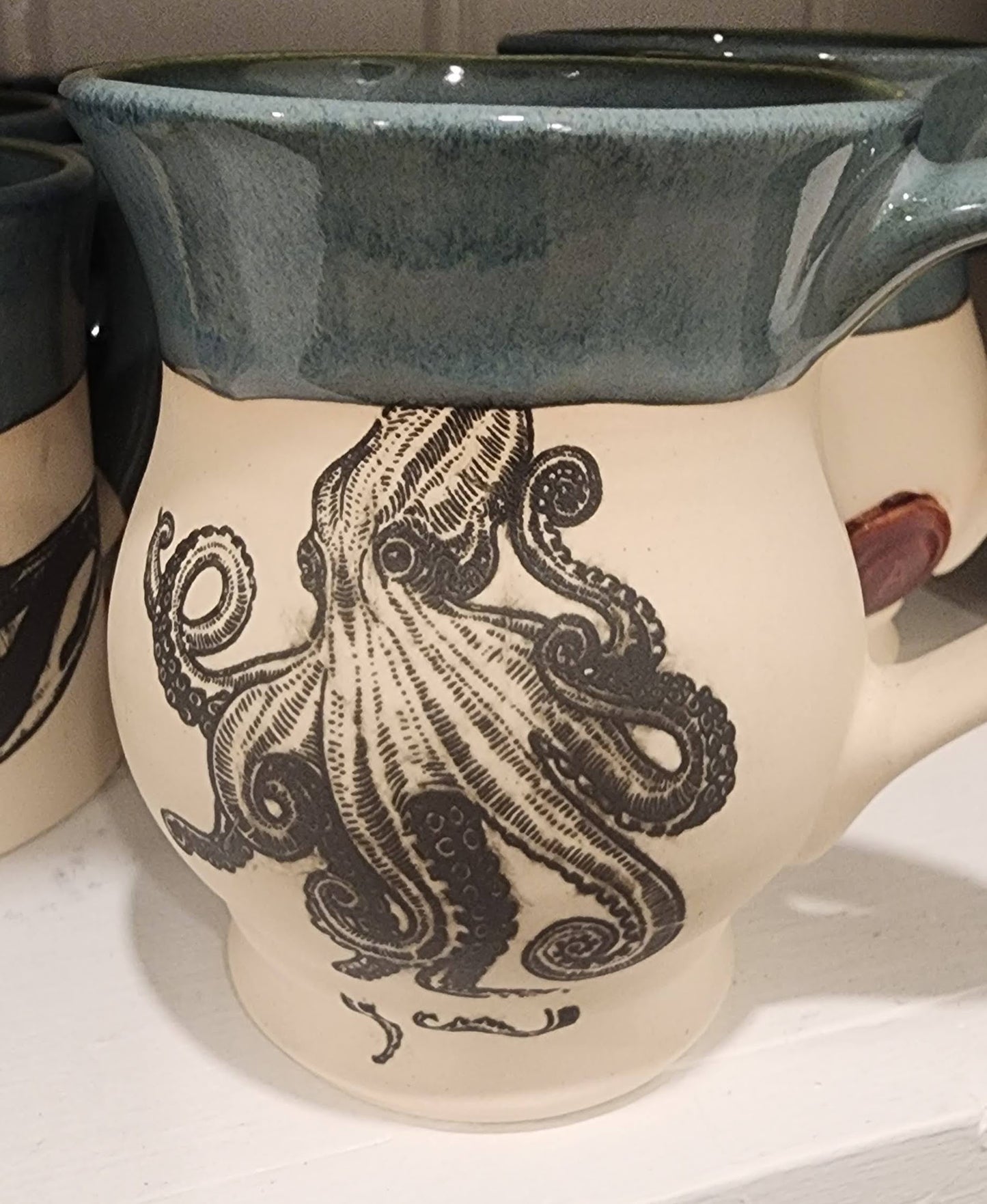 The Giant Pacific Octopus Mug: Made by Alex Shaffer, local artist, handmade in Roberts Creek